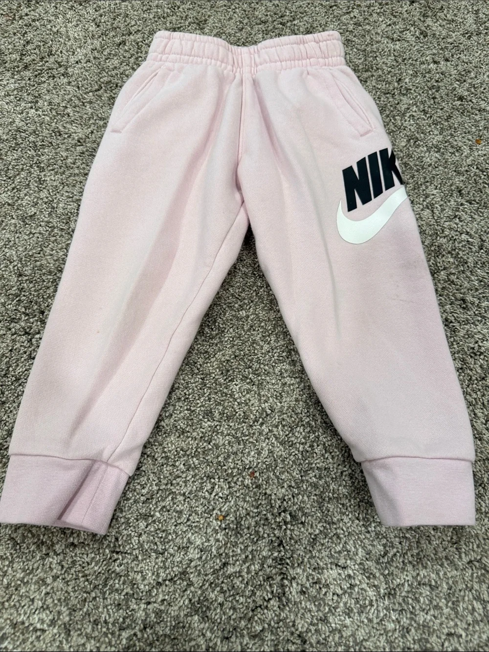 Nike Pink Kids Fleece Joggers with Black & White Logo